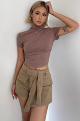 Buckle Detail Asymmetrical Hem Denim Shorts