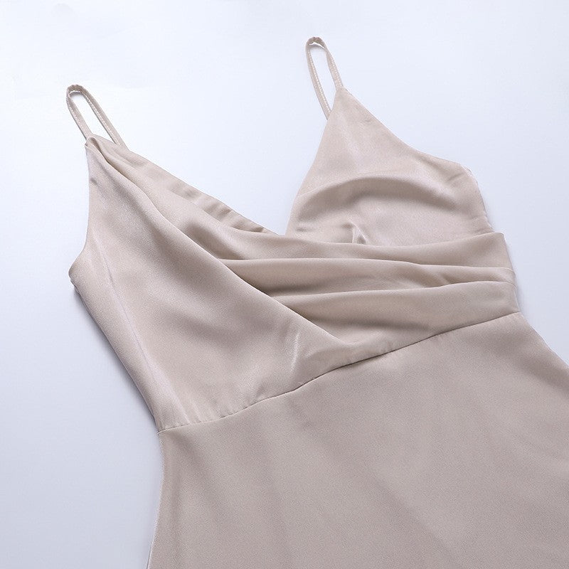 Vestido cruzado con purpurina Carella