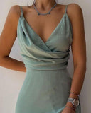 Vestido cruzado con purpurina Carella