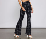 Pantalones acampanados con estampado floral