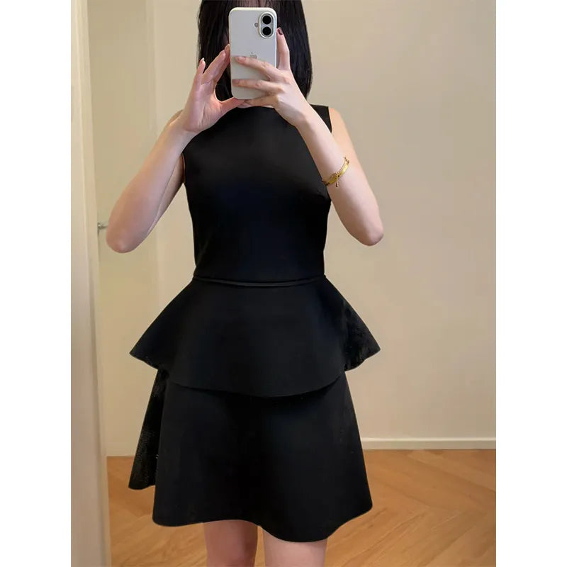 Solid Sleeveless Round Neck Peplum Top