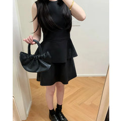 Solid Sleeveless Round Neck Peplum Top