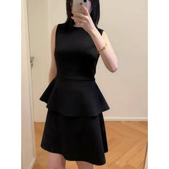 Solid Sleeveless Round Neck Peplum Top