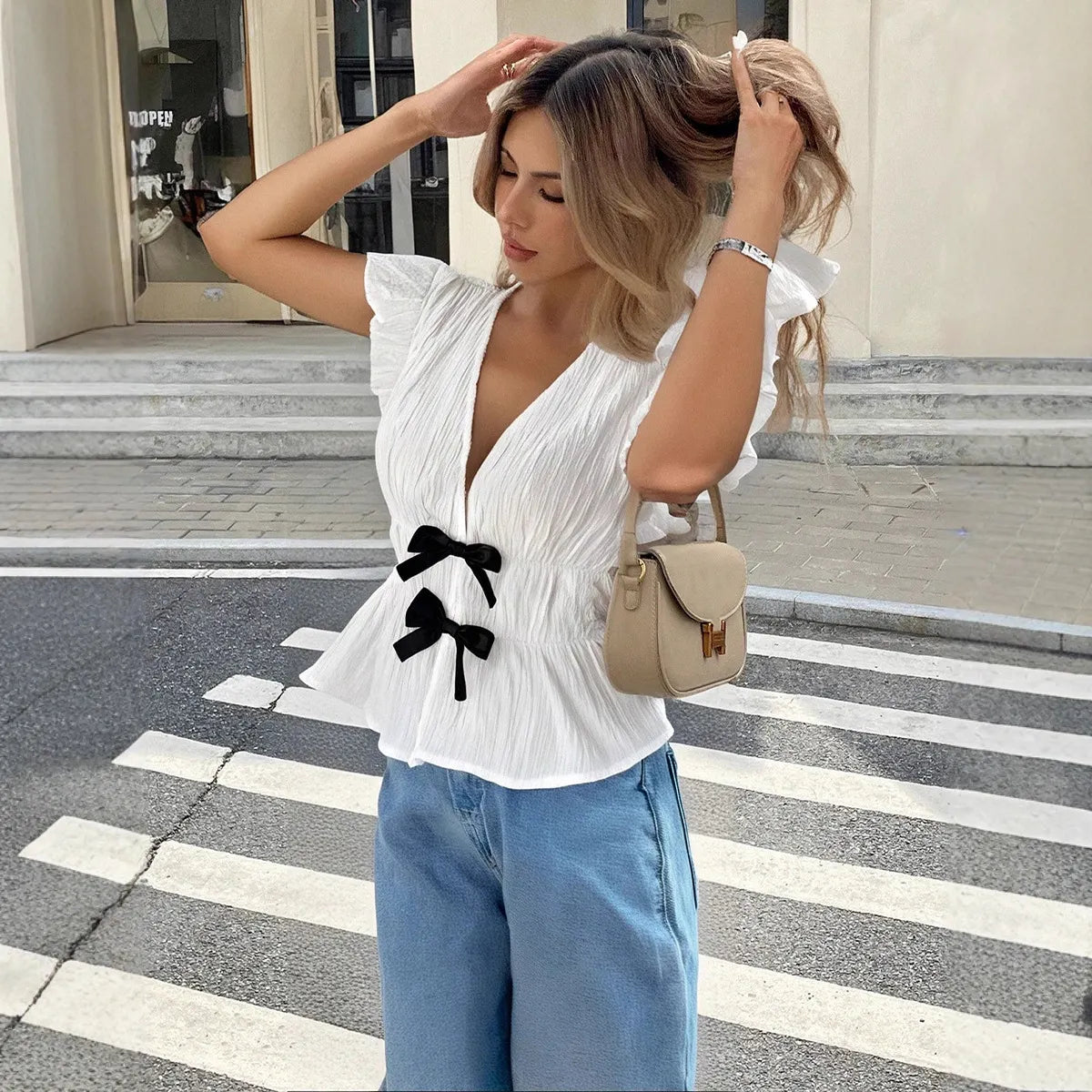 V-Neck Ruffle Cap Sleeve Double Bow Peplum Textured Top