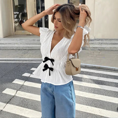V-Neck Ruffle Cap Sleeve Double Bow Peplum Textured Top