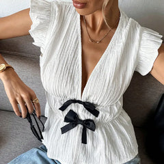 V-Neck Ruffle Cap Sleeve Double Bow Peplum Textured Top